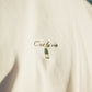 Camiseta C’est la vie off-white